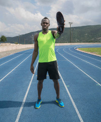 Usain Bolt with his Enertor sports insole